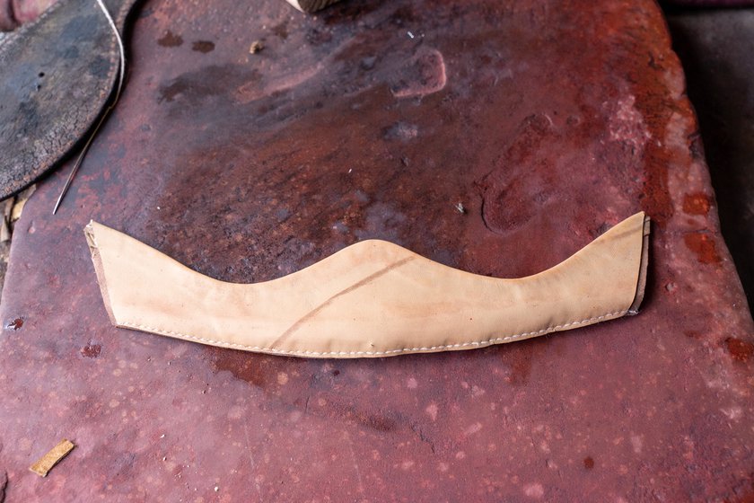 Right: The upper portion of a jutti made from cow hide