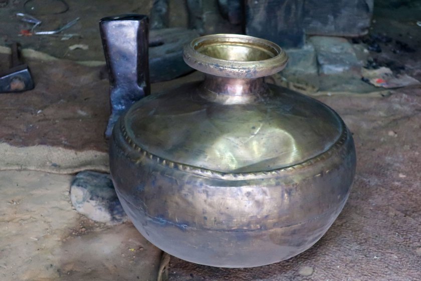 An old brass gaagar (metal pitcher) at the shop. The gaagar was used to store water, milk and was also used to create music at one time