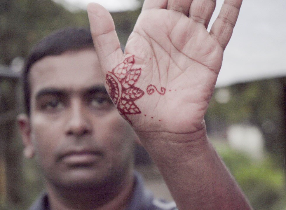 A special friend showing mehendi on his hands on the occasion of Nag Panchami celebrated on the fifth day of Shravan