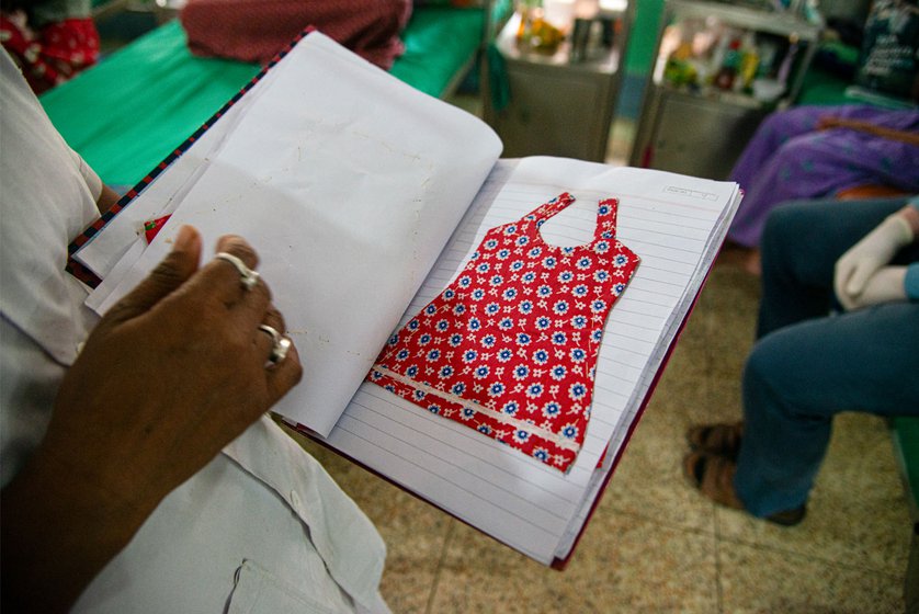 Right: A dress sample made by a 16-year-old bone TB patient at  Bantra Society. Here patients are trained in needlework and embroidery to help them become self-sufficient