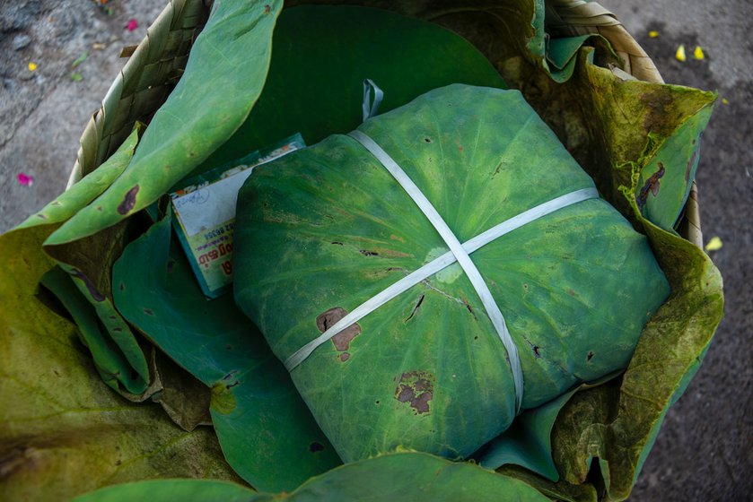 Right: Varieties of jasmine are packed in lotus leaves which are abundant in Kanyakumari district. The leaves cushion the flowers and keep them fresh