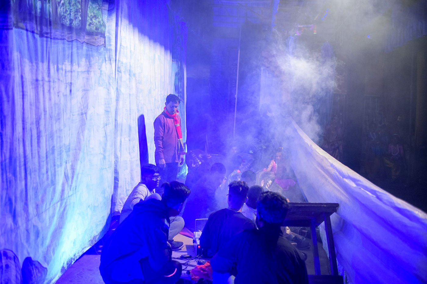 The artist prepares the set for the Kaliyo daman scene of the Raas performance wherein Lord Krishna defeats the Kaliyo Naag living in the Yamuna river