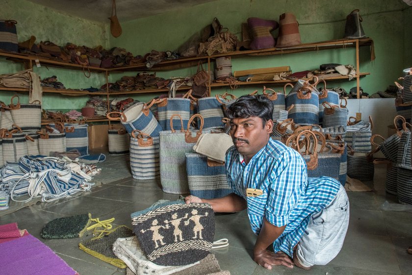 Left: In Mekalmardi village, in an effort to enhance his income, Dastagir Jamdar has been combining jute, leather and wool to improvise bags and other items. Right: Dinesh Seth, shop manager, checks the quality of a blanket. The average price of such blankets in the shops ranges between Rs. 800 and Rs. 1,500, and smaller rugs cost Rs. 400 to Rs. 600. But the demand for Deccani woollens has been steadily falling