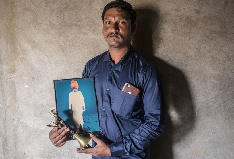 Right: Arjun Javir holding a photo of Maruti Desai, his late grandfather, considered one of the finest shehnai players in Manakapur