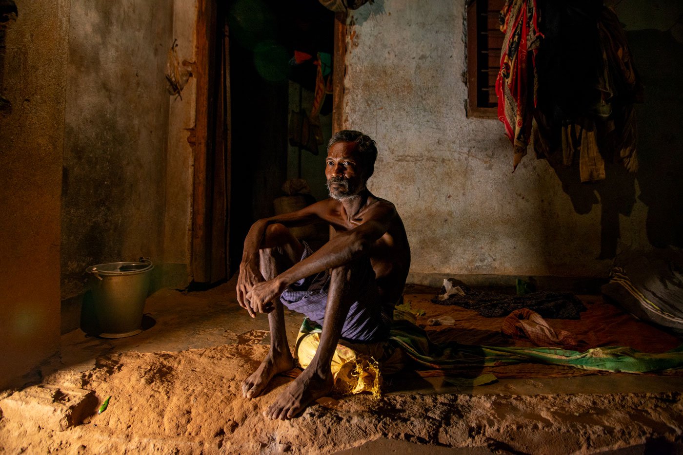 Karmu Nayak of Benashuli says he doesn't have the physical strength to go to the forest to gather leaves to sell and buy food