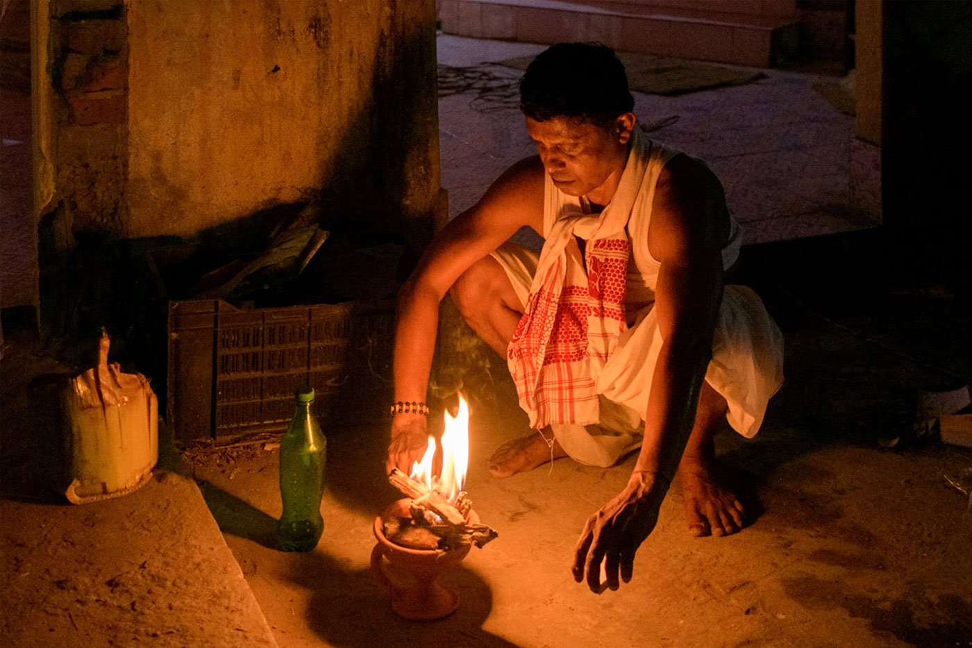 Dutta, after his performance as Boraho, lights a dhuna for prayer