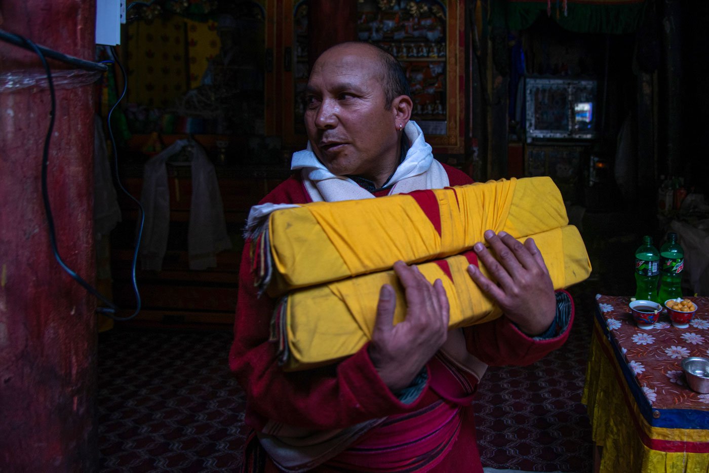 Sonam Dorje, one of the organisers of the Saga Dawa festival, carries holy scrolls from the monastery in Hanle. The scrolls accompany Buddha’s idol as it travels across villages and hamlets in the region