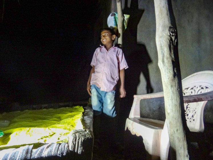 Left: Ramchandra Dodake's elder son Ashutosh, on the night vigil.