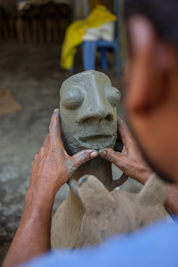 Dilli anna gives shape to the Kannisamy idol's face and says, 'from the time I start making the idol till it is ready, I have to work alone. I do not have money to pay for an assistant'