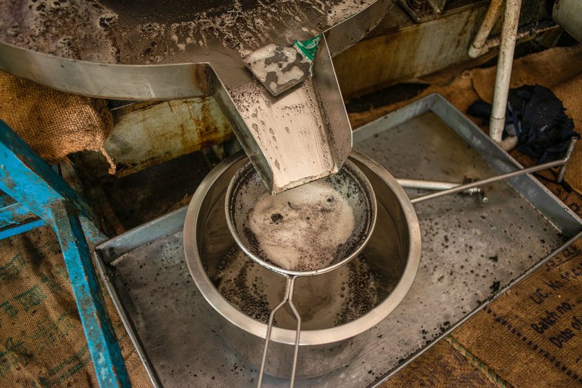 The wooden press at Srirangam squeezes the golden yellow oil out of the sesame seeds