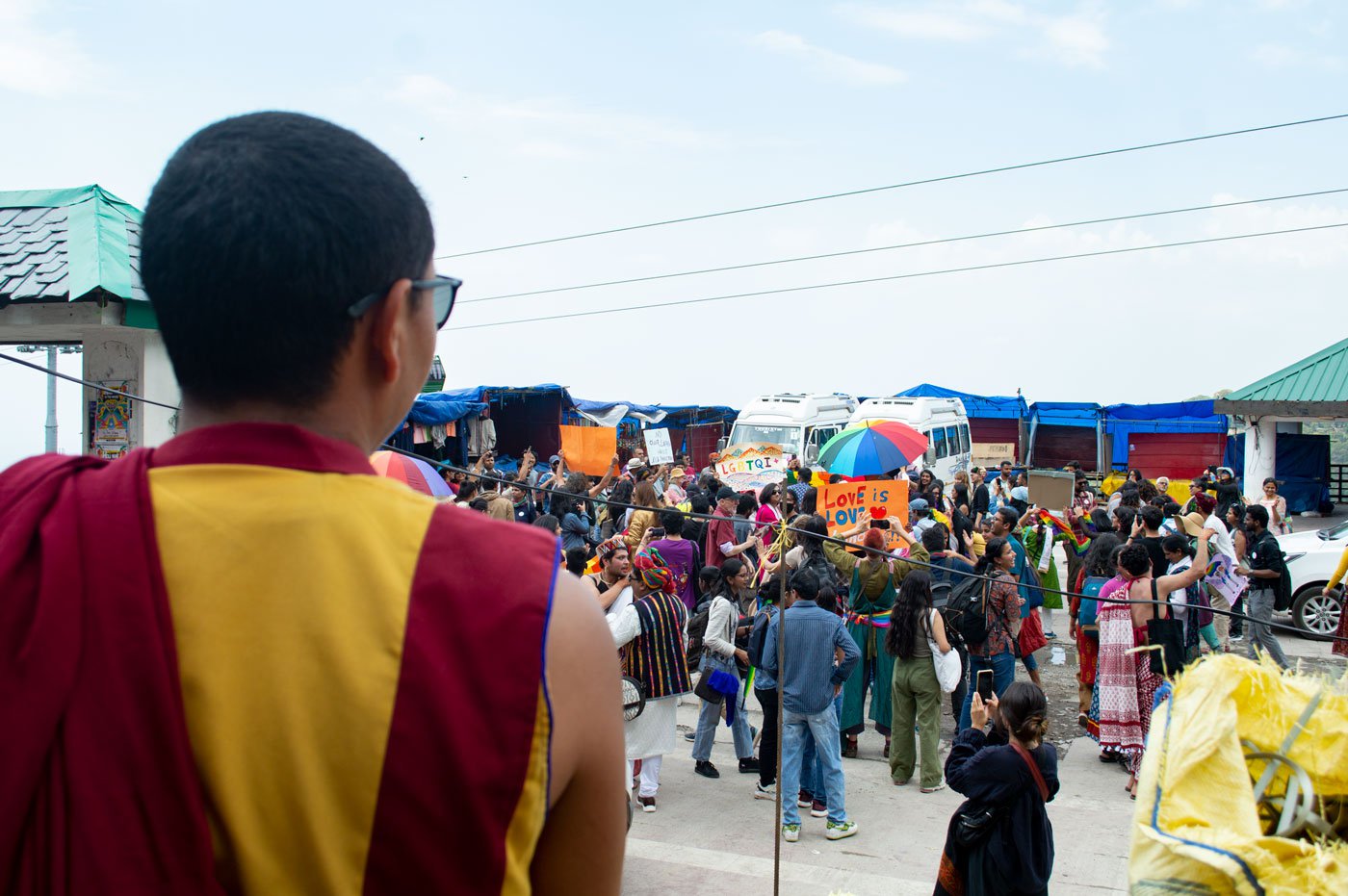 Monk Tsering looking at the parade. 'They are fighting for their rights and many other countries have given these rights [to marriage] to their people, maybe it's time for India to follow,' he says