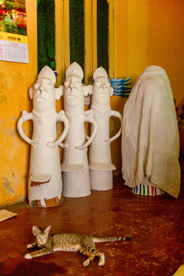 Left: The Kannisamy idols painted in white.