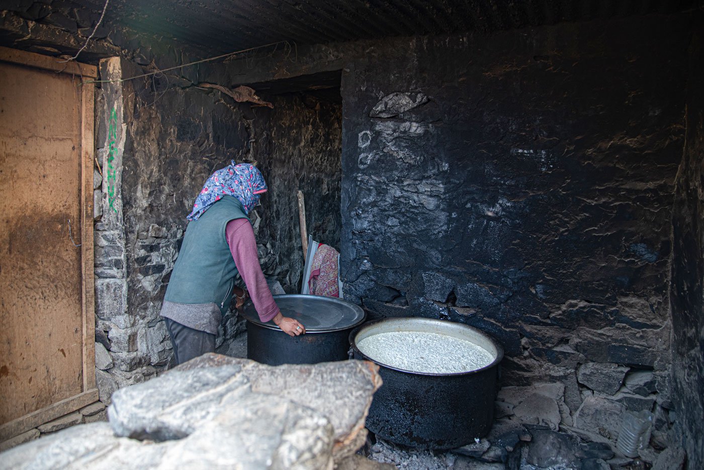 Fresh milk being boiled to make churpi , a local cheese made out of fermented yak milk