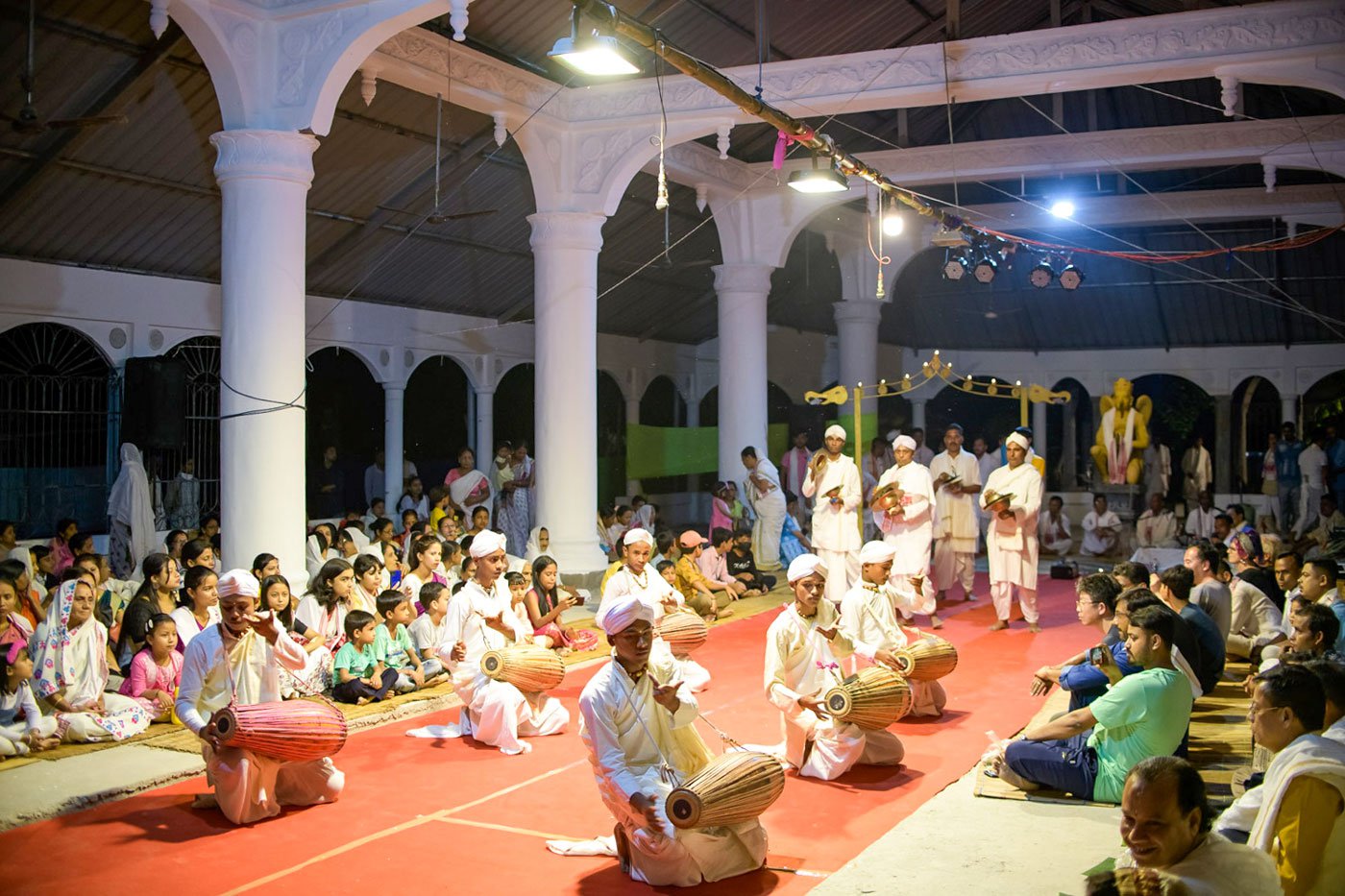 Performance at the namghar; a traditional gayan-bayan curriculum begins with learning to play different taals on the palm of your hands