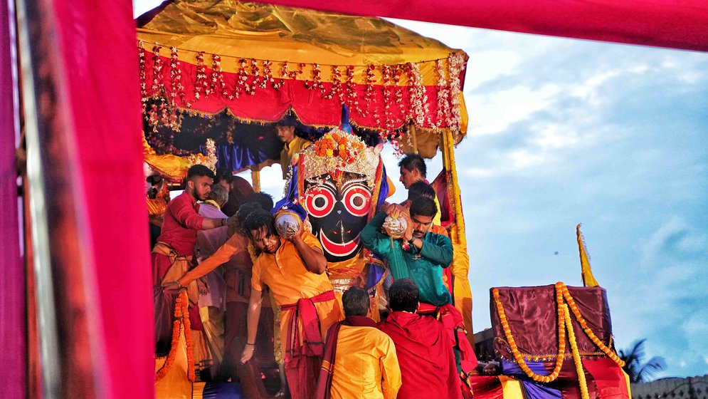 Lord Jagannath being brought down from the rath by priests of the temple in Jagdalpur, Chhattisgarh