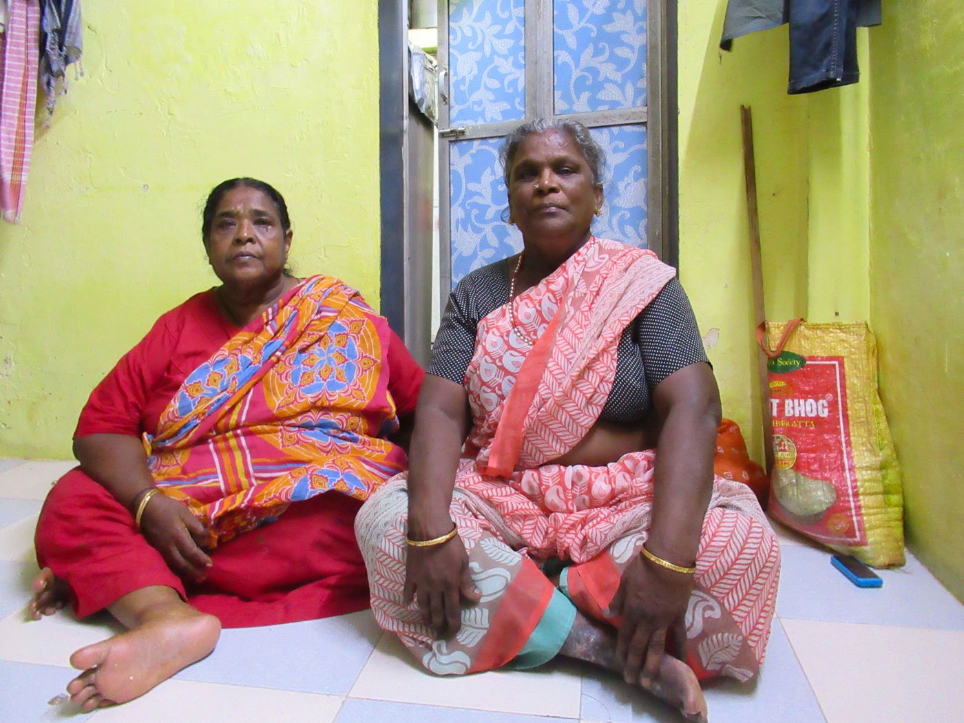 Pushpaveni (left) came to Dharavi as a bride at the age of 14-15, Vasanti arrived here when she got married at 20