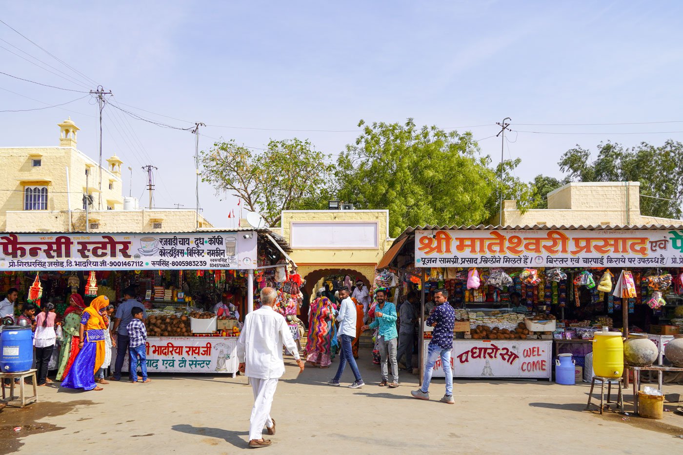 There is small bustling market outside the temple selling items for pujas, toys and snacks