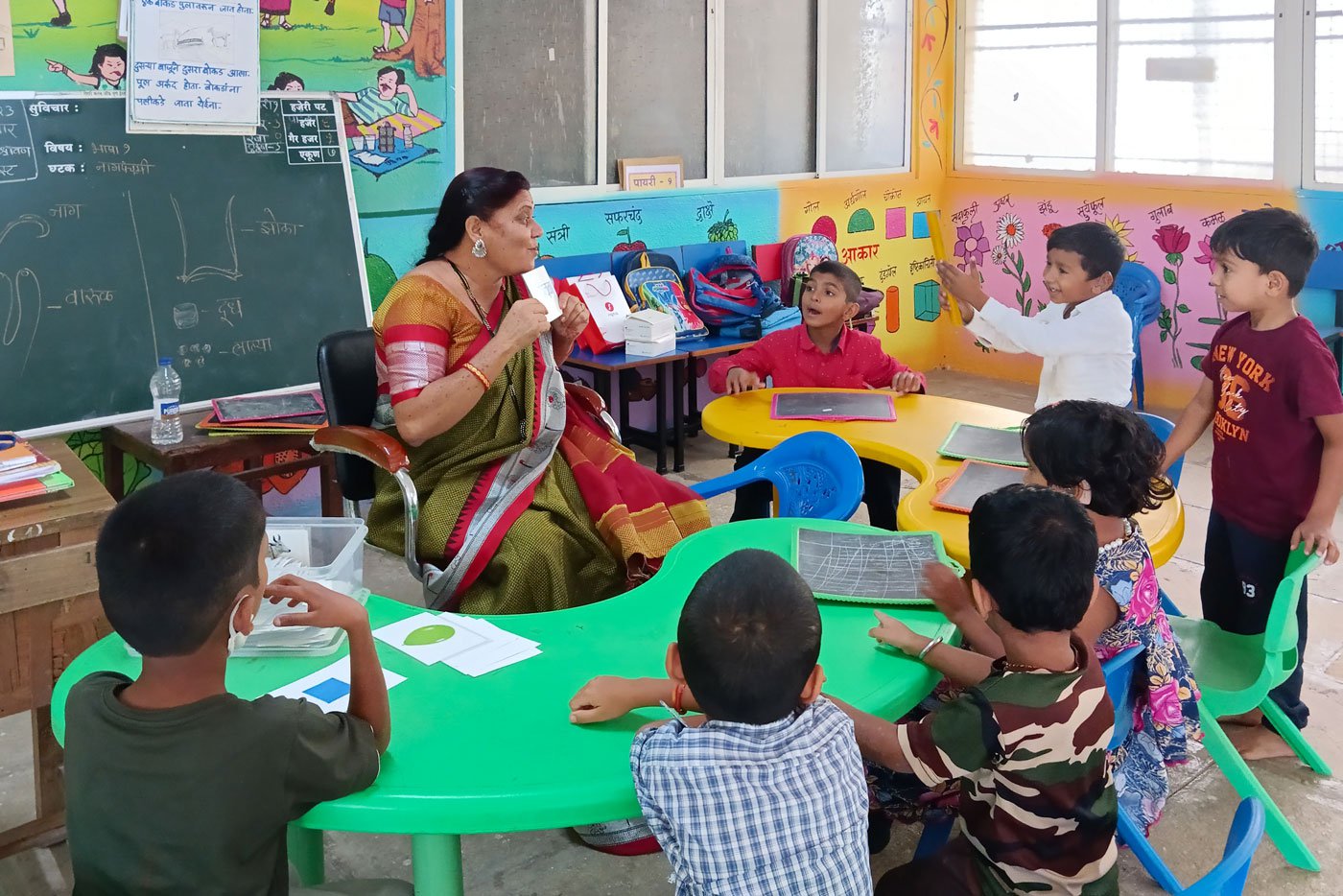 Sunita Zine teaching colours to the youngest class at Dhayari school