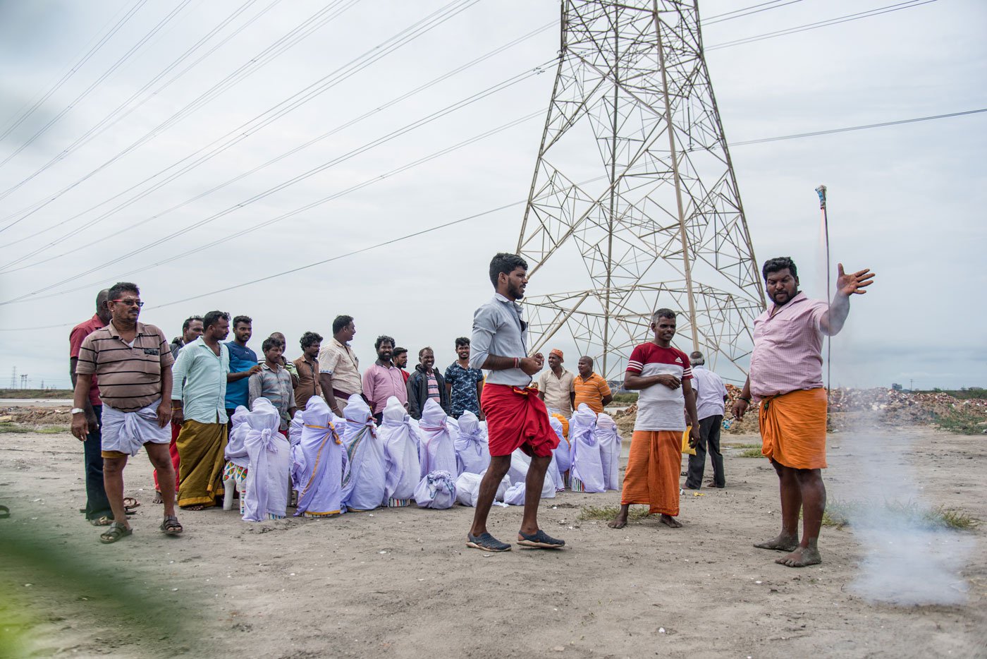 Crackers are burst as part of the ritual of returning with Kannisamy idols to their villages.