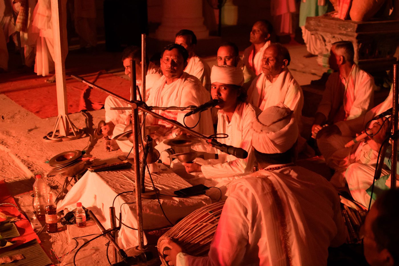Debojit Dutta (centre) sings with the group of gayans to provide the background music in the folk play, Nri Simha Jatra