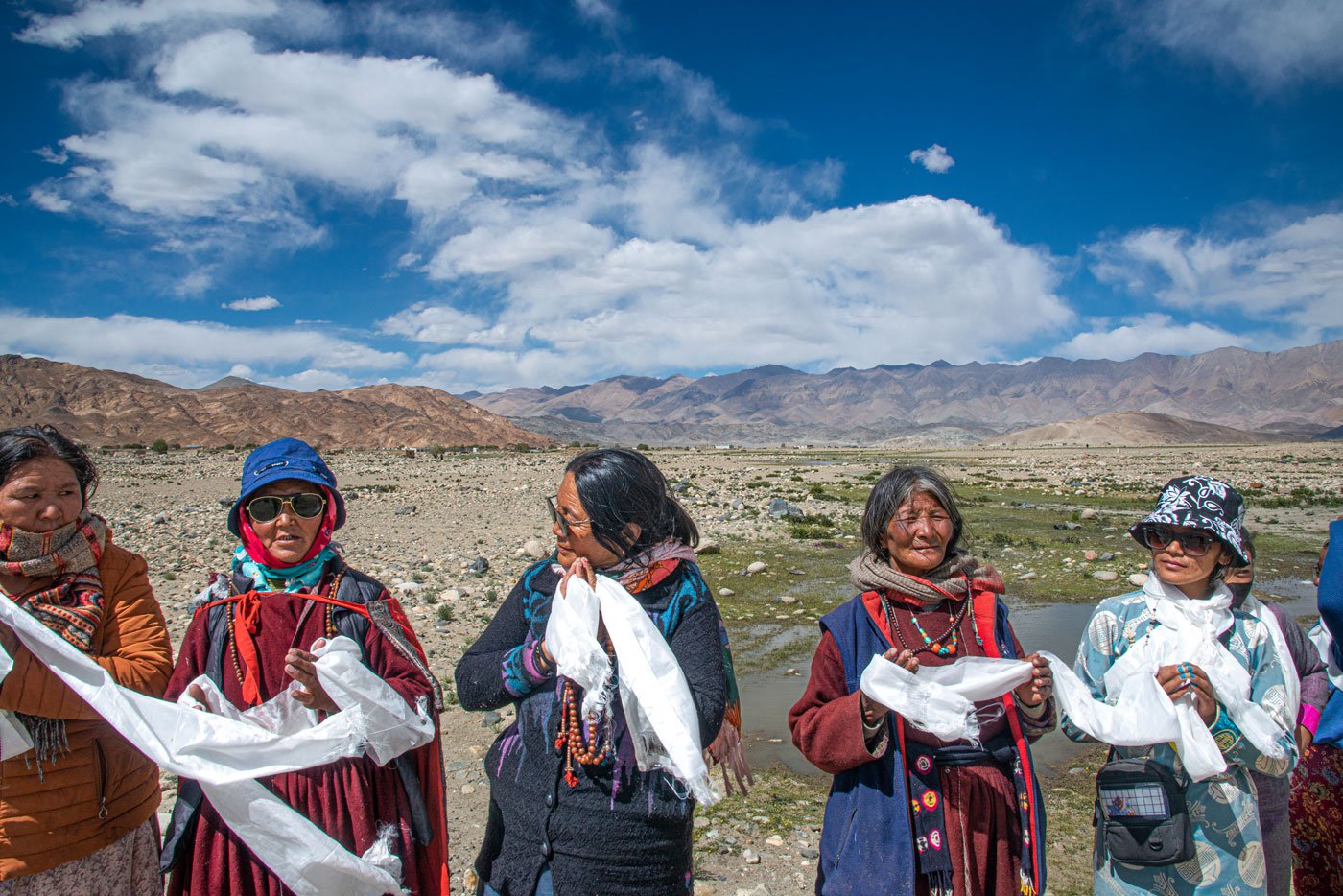 The procession heads towards the local Gompa in Punguk village where residents are waiting to welcome them with white scarves