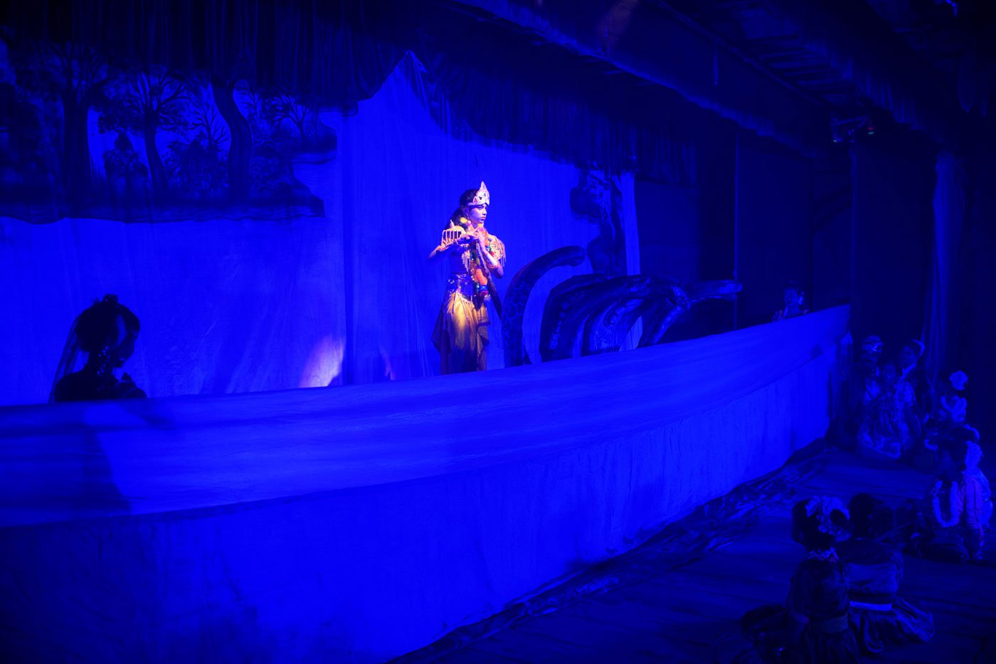 The Kaliyo daman scene shows Krishna defeating the Kaliyo Naag living in the Yamuna river and dancing on his head