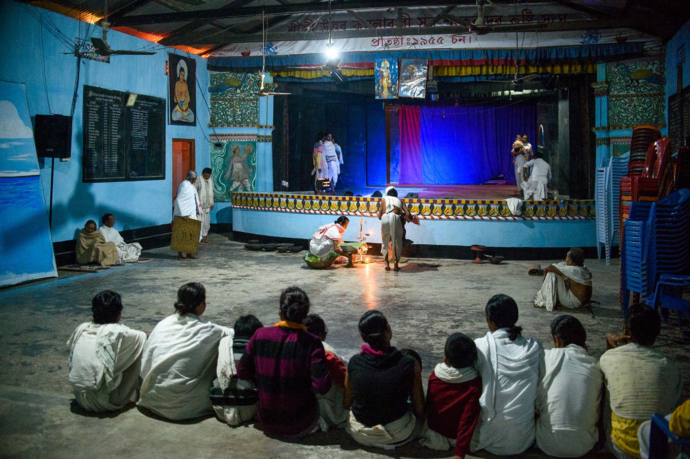At the Uttar Kamalabari Satra in 2016, monks prepare for the rehearsal of the Keli Gopal play set to be performed at the mahotsav. Before this auditorium was built in 1955, performances happened in the namghar (prayer house)