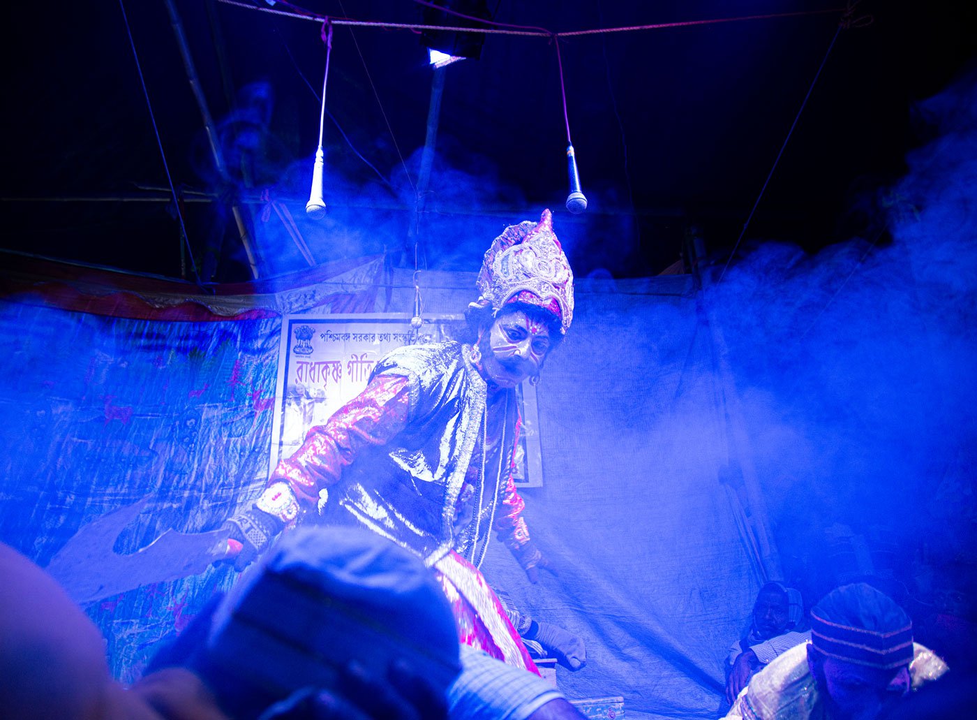 A scene from the pala gaan where Dakkhin Rai appears in the dream of Dhana, asking him to sacrifice Dukhey as his kar (tax). Only then would he find honey in the forest