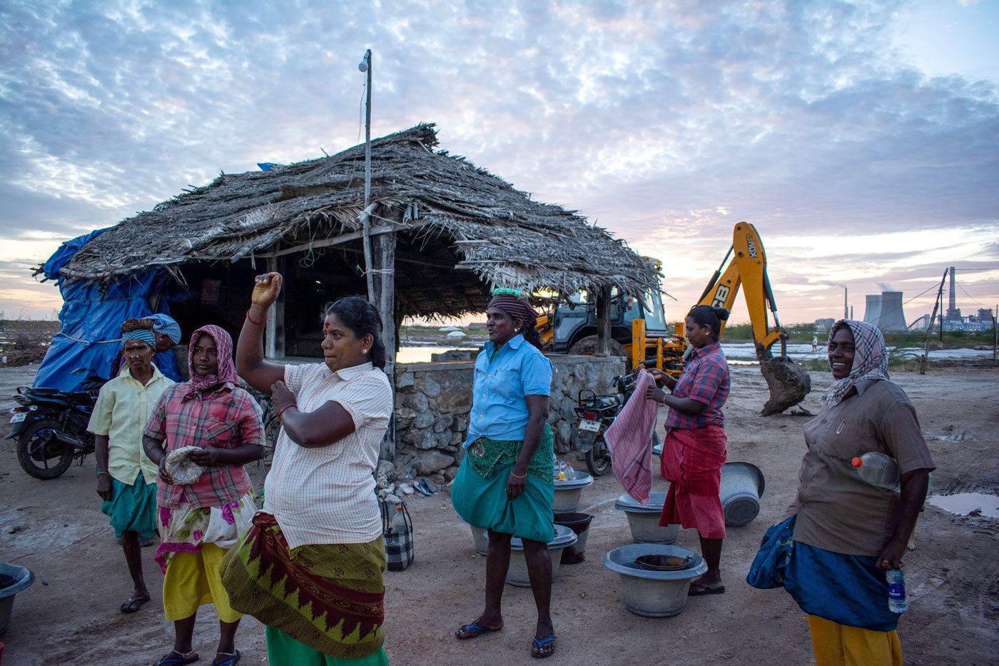 At dawn, Thoothukudi's salt pan workers walk to their workplace, and get ready for the long hard hours ahead (Rani is on the extreme right in a brown shirt)