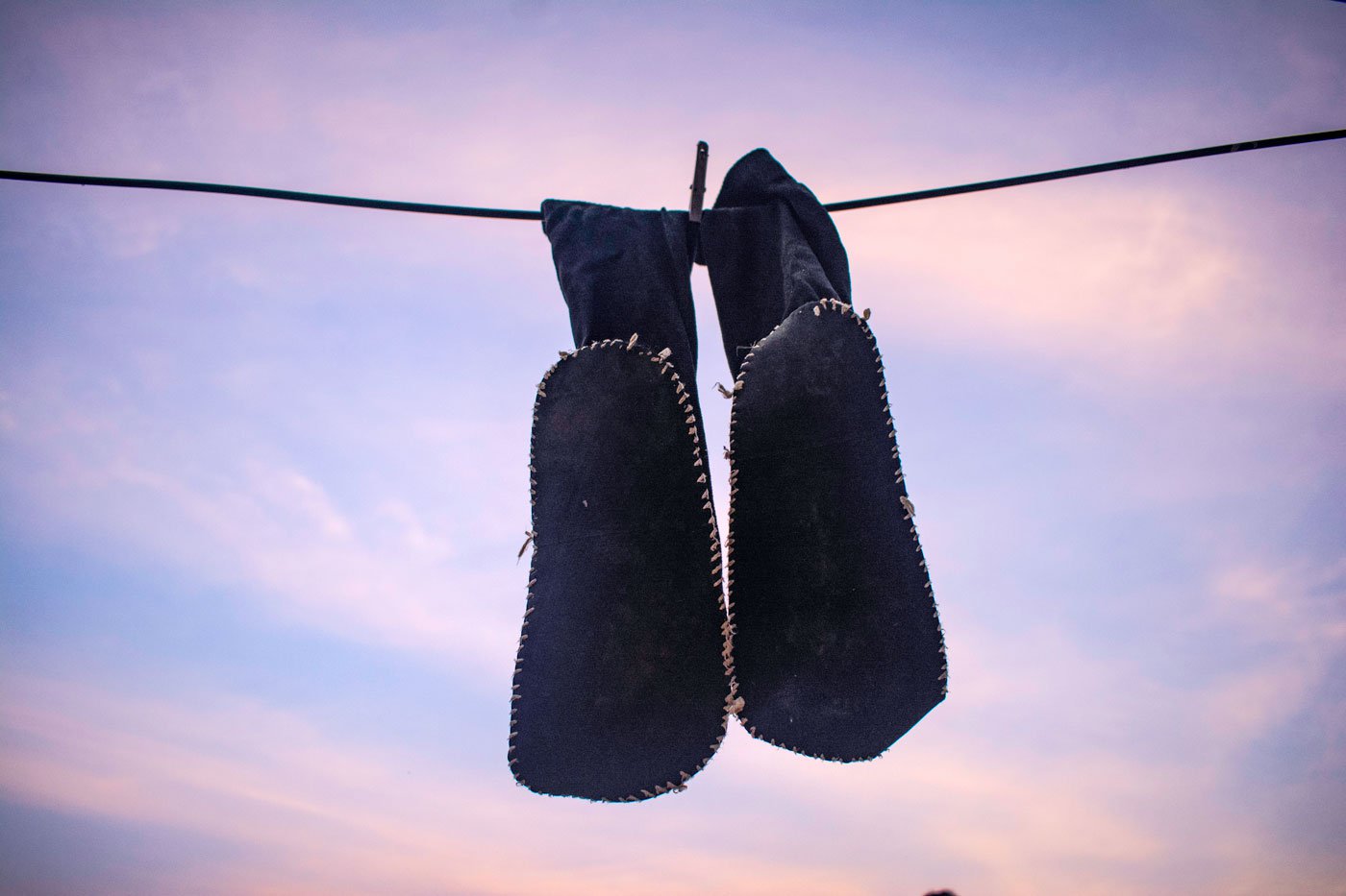 A few women wear black socks with a rudimentary refurbished base