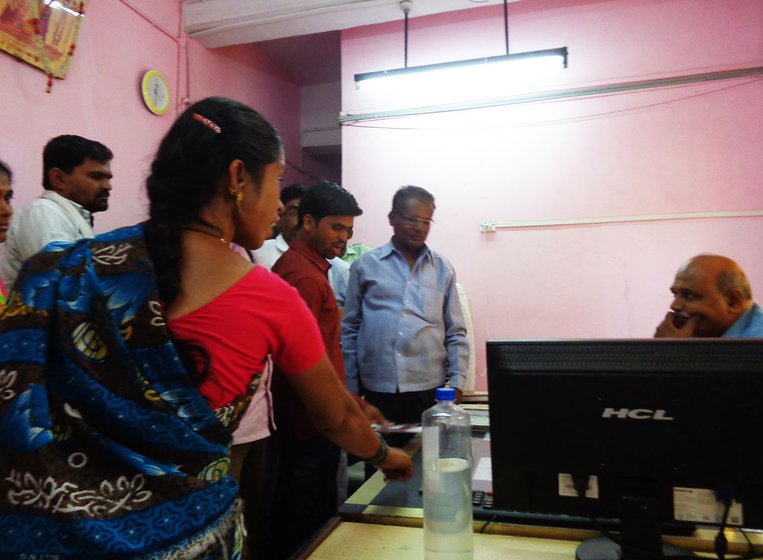 Furious depositors at the Osmanabad District Cooperative Bank, demanding their money back