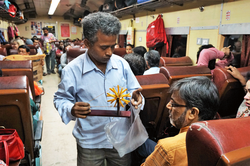 Man selling goods in the train