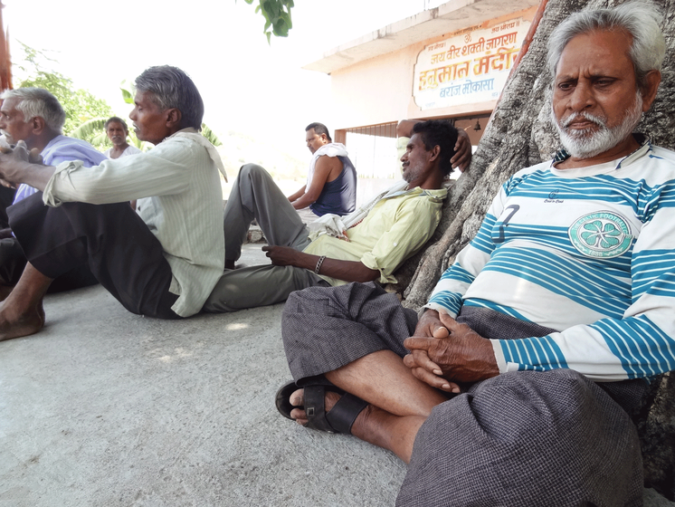 Baranj Mokasa lost over 500 hectares to the coal mine. Many now while away their time in the absence of any work 
