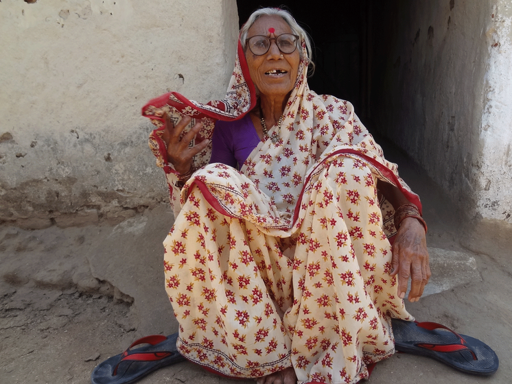 Ahilyabai Patil sitting outside her house