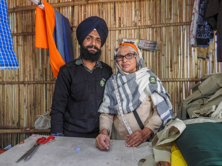 Harjeet Singh (left) and Mohini at their worktable