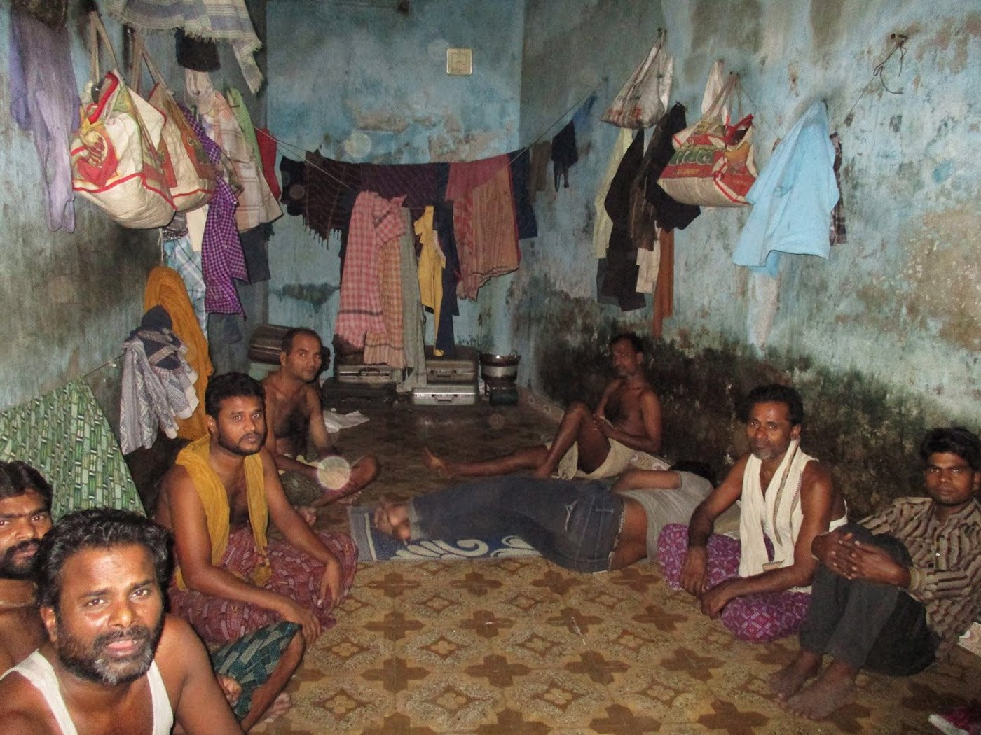 workers are sitting in room