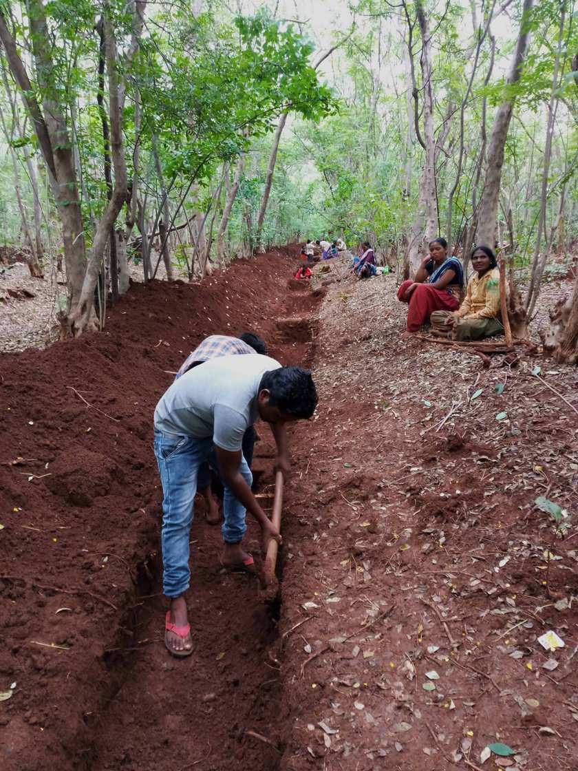 Atish Metre (right), who has completed his MBA coursework, also went to work at MGNREGA sites in Kamthana village in Karnataka