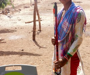 Jignisha Gamit holding an archer