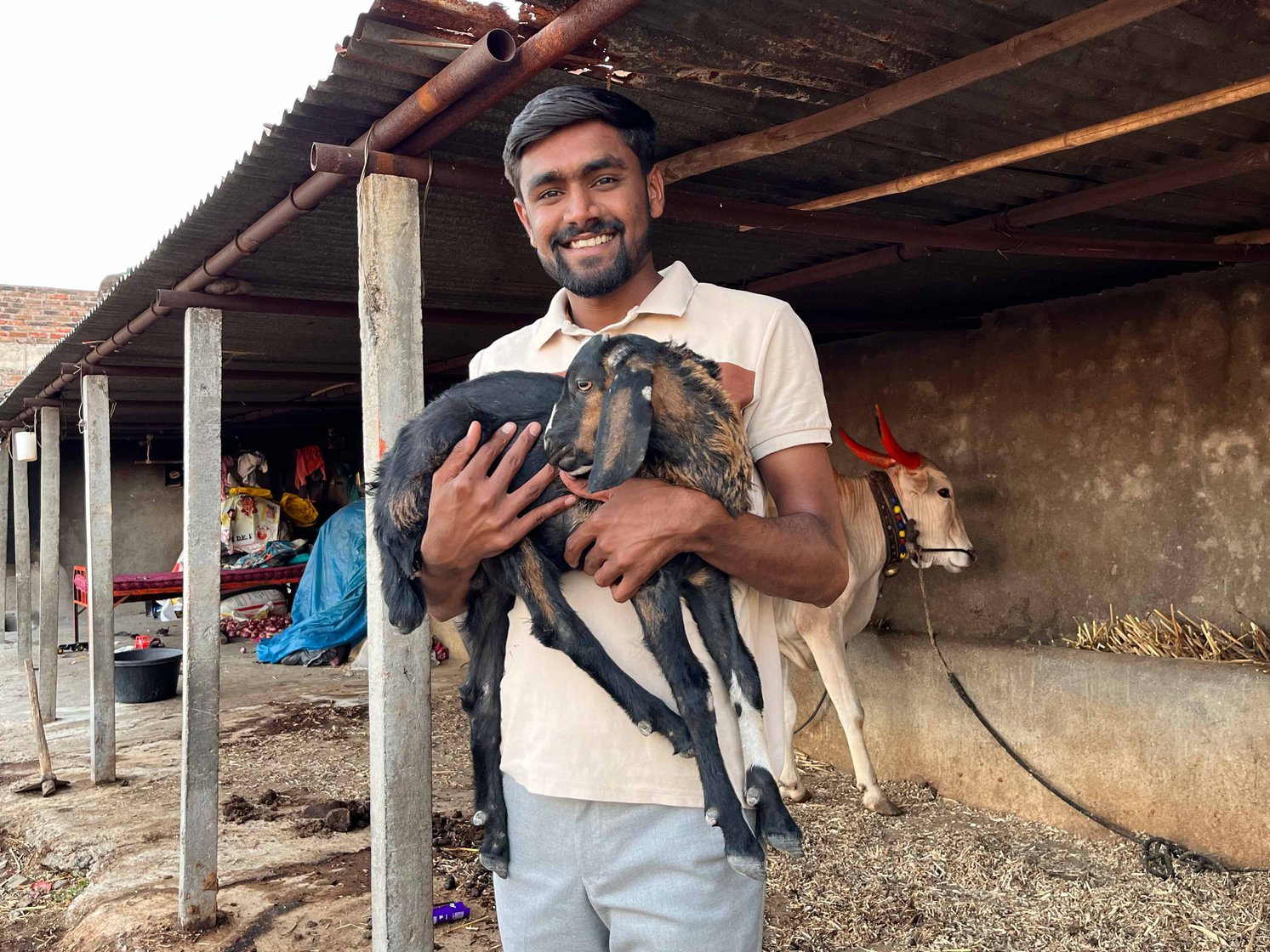 Khade’s family’s animals live in an open shelter right next to the house