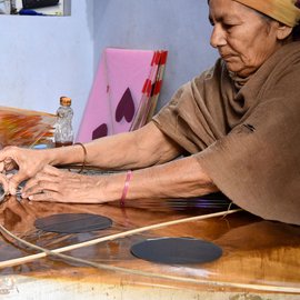 The harsh lives of the women kite makers of Khambhat and Ahmedabad stand out in stark contrast against the brilliantly coloured skies they light up with their labour