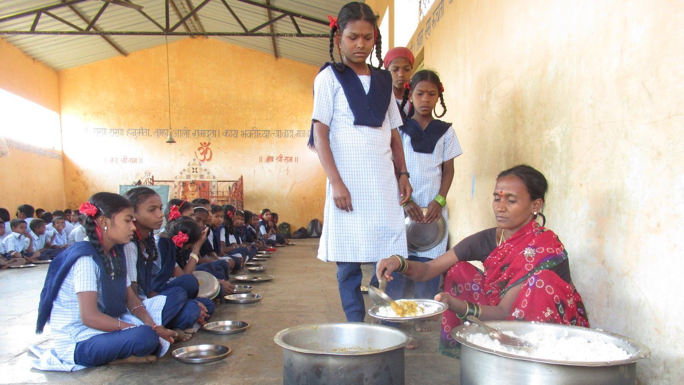 Children being served mid-day meal
