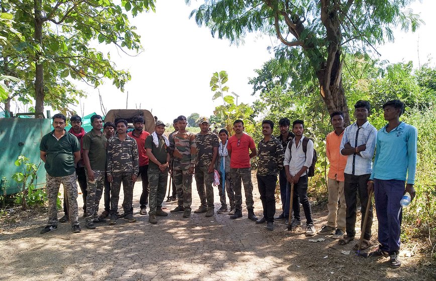 Forest guards and teams of villagers before starting a foot patrol from the base camp.