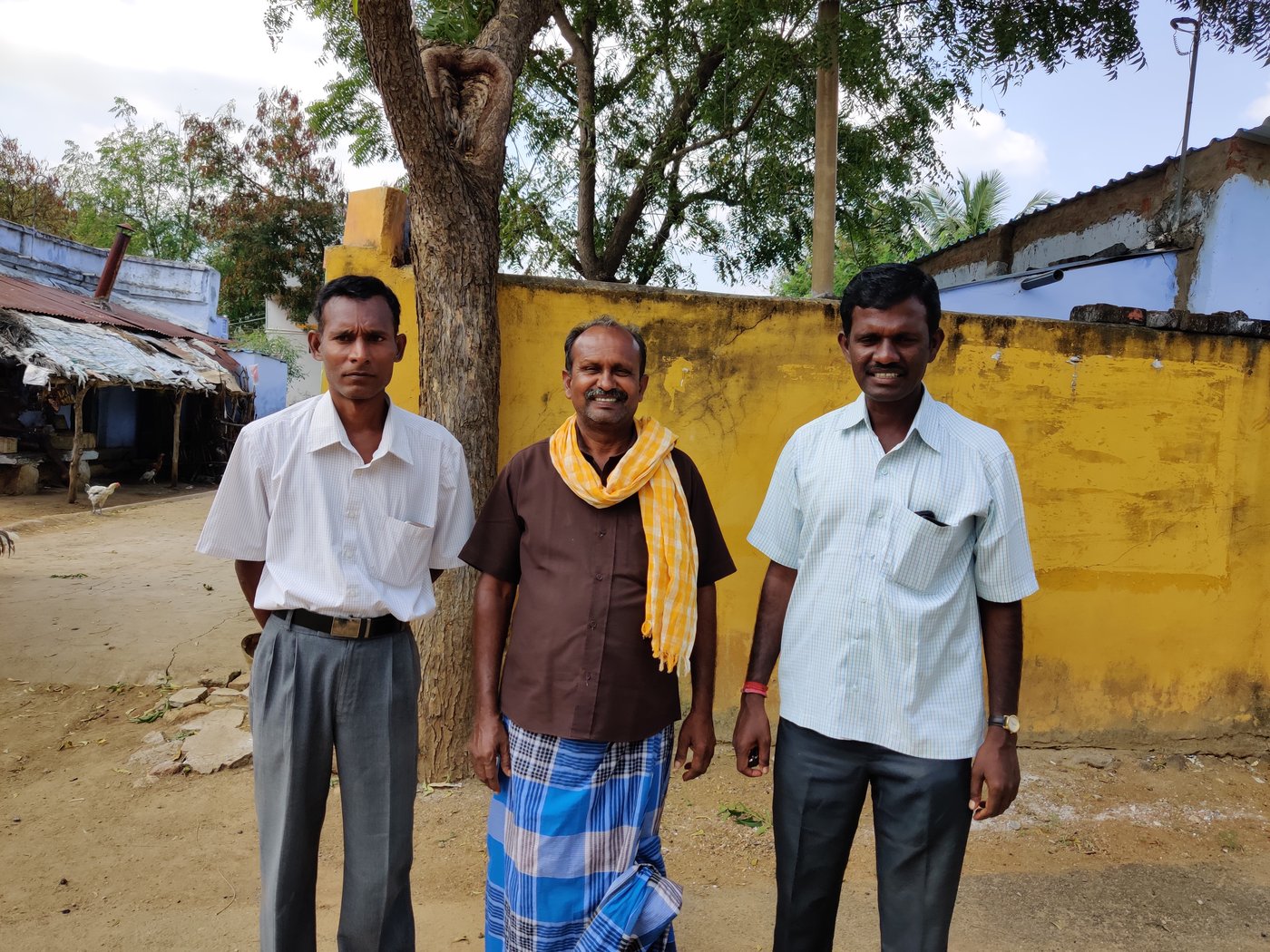Left: M. Muthu, the chief executive of the temple in Koovalapuram dedicated to a holy man revered in village folklore. Right: T Selvakani (far left) with his friends. They campaign against the 'iscriminatory 'guesthouse' practice but with little success