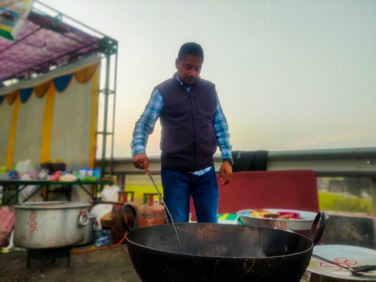 Bilawal Singh (left) and his cousin Rashwinder run a langar at the Shajahanpur site: 'We have enough supplies coming in. We can stay here till the 2024 elections'

