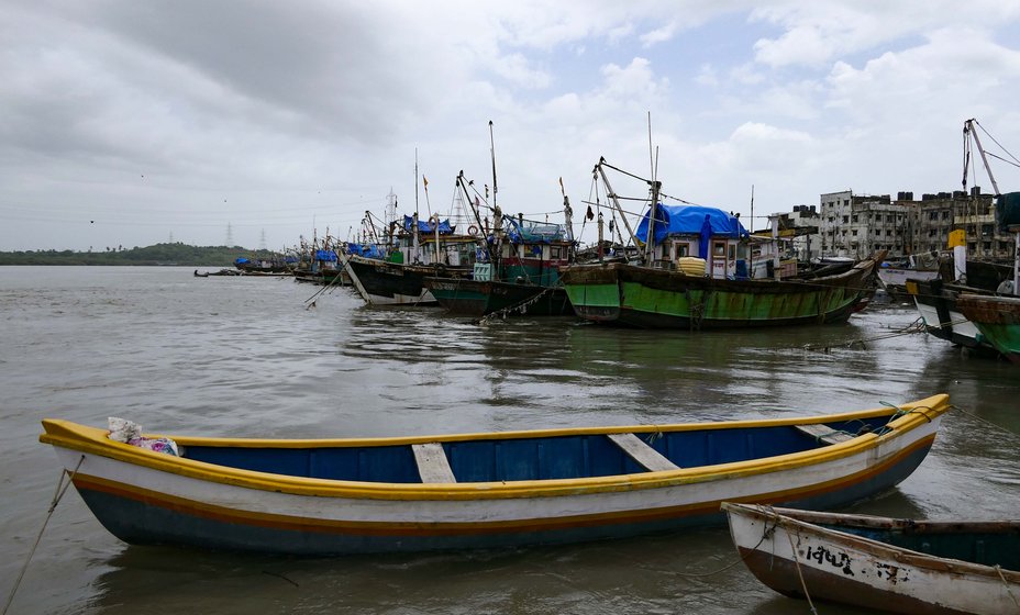 Left: Dinesh Dhanga (on the right right) heads an organisation of around 250 fishermen operating small boats; its members include Sunil Kapatil (left) and Rakesh Sukacha (centre). Dinesh and Sunil now have a Ganapati idol-making workshop to supplement their dwindling income from fishing 