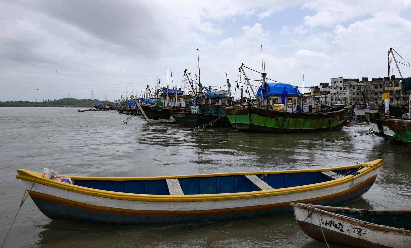 Left: Dinesh Dhanga (on the right right) heads an organisation of around 250 fishermen operating small boats; its members include Sunil Kapatil (left) and Rakesh Sukacha (centre). Dinesh and Sunil now have a Ganapati idol-making workshop to supplement their dwindling income from fishing