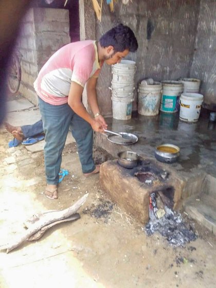 Suresh Bahadur's work required making rounds on a bicycle at night; he used wood as cooking fuel during the lockdown

