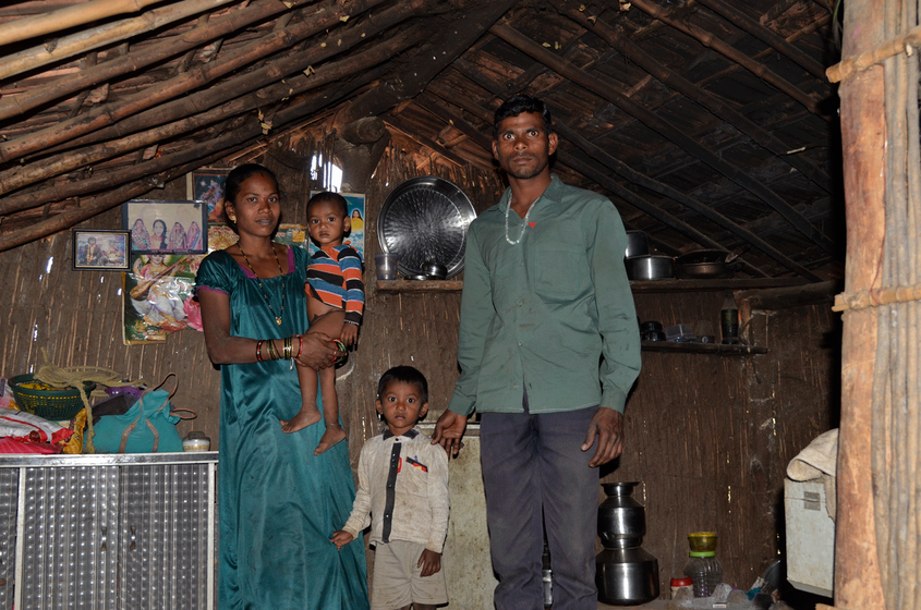 A family with their children in their house 