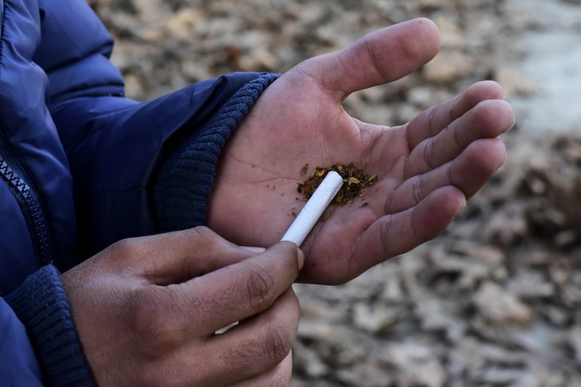 Left: A young man from the Chursoo area (where Azlan Ahmad also lives) in south Kashmir’s Anantnag district, filling an empty cigarette with charas. 