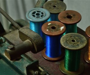 Bobbins with colourful silk thread